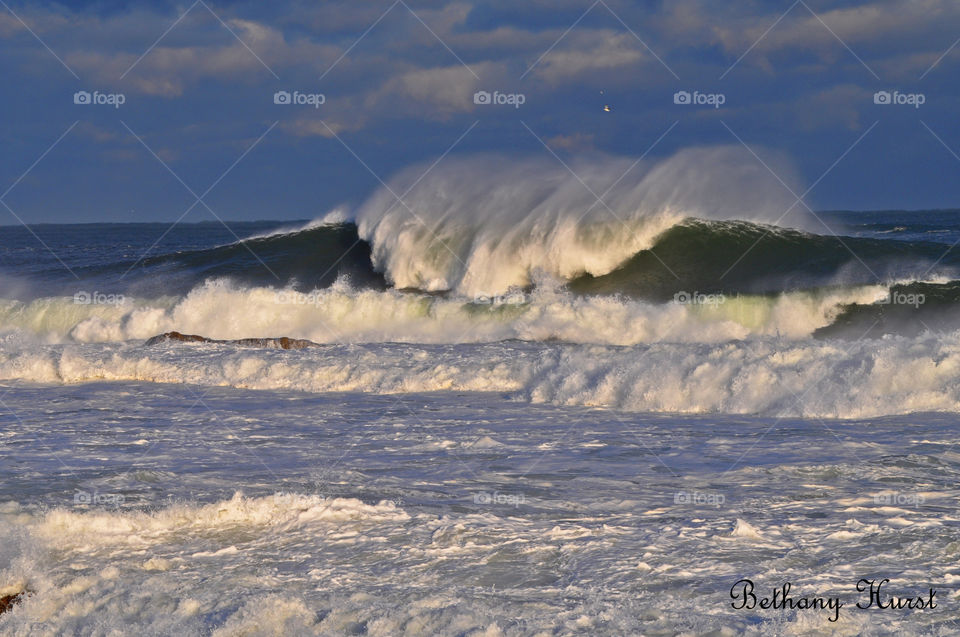 Ocean rage. waves crash along the backshore in gloucester,ma