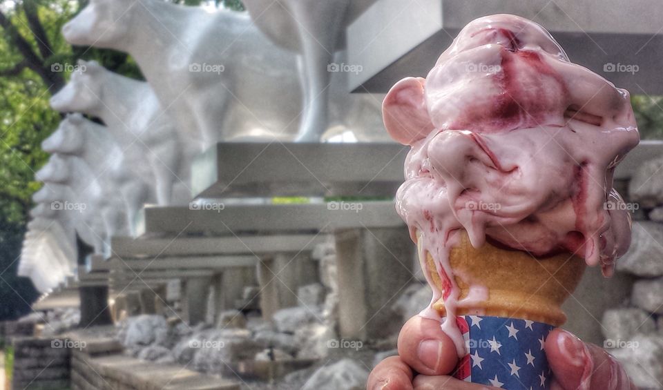 Hands Holding Ice Cream. Deliciously Melting 