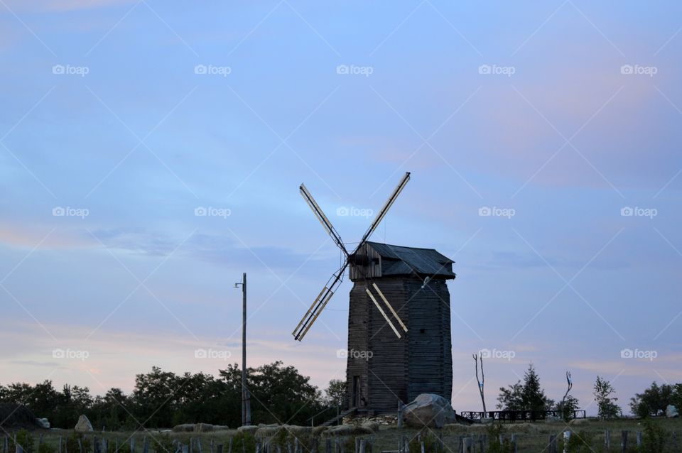 mill on sunset background