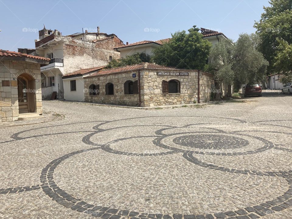 Beach time on holidays. Blue sky and tall palm trees. Sunsets and sunny days. Summertime in Kusadasi. Vacation travel in Turkey . Summer view. Sunny day during vacation 