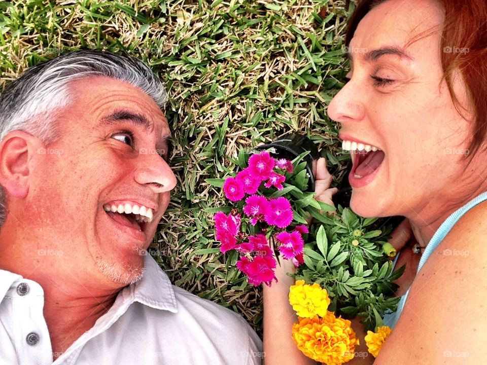 Couple with flowers in garden