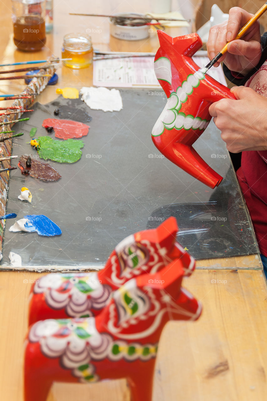 Dala Horse. Dalecarian Horse. Handmade and painted wooden souvenir, toy from Sweden.