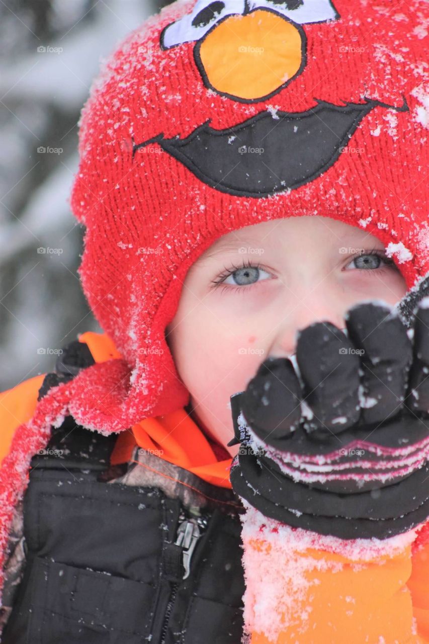 Those blue eyes of his can melt any frozen heart on this cold winter day out in the snow. 