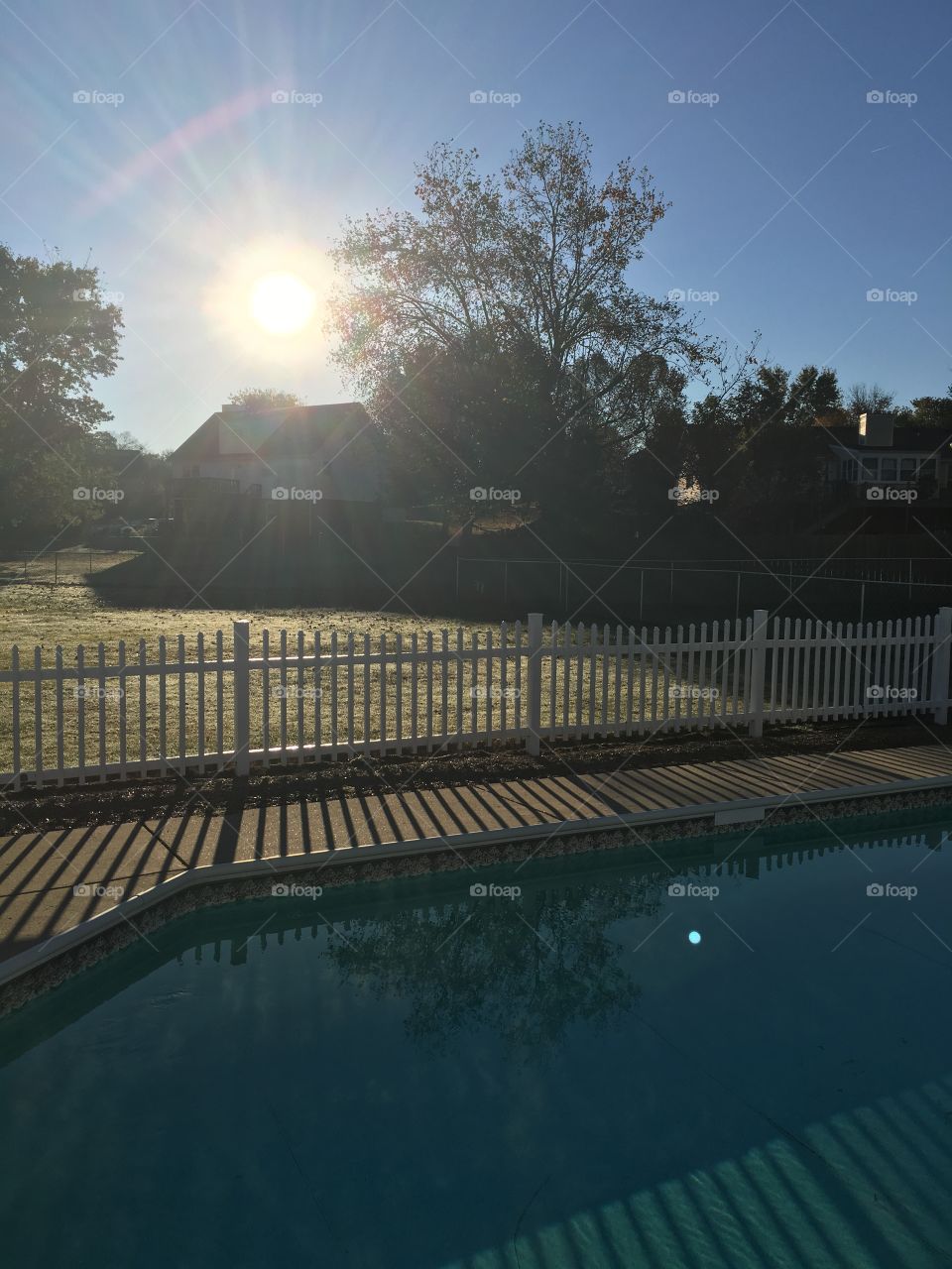 Swimming pool and sun rise