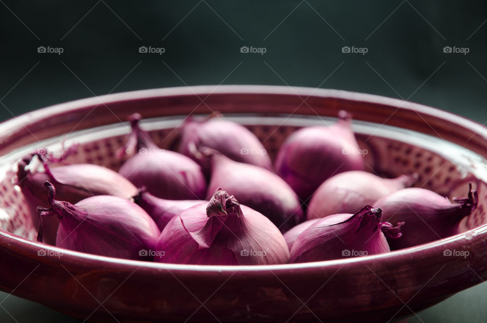 Red onions in a Moroccan ceramic dish