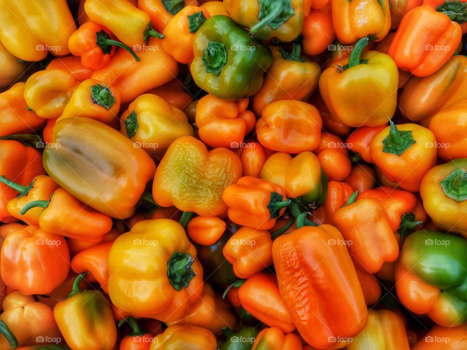 Elevated view of orange bell peppers