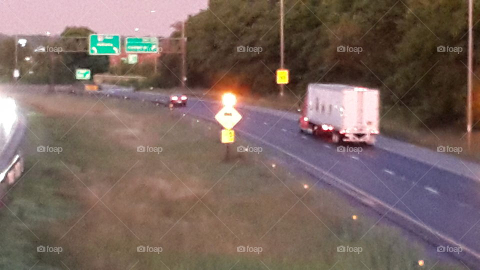 Highway lights at dusk