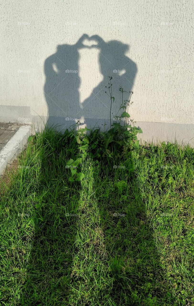 two woman's shadows, female friends