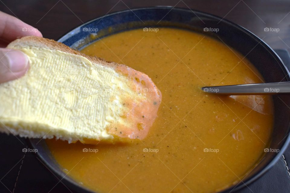 Vegetable soup with bread in a bowl.  Healthy and dietary food concept.