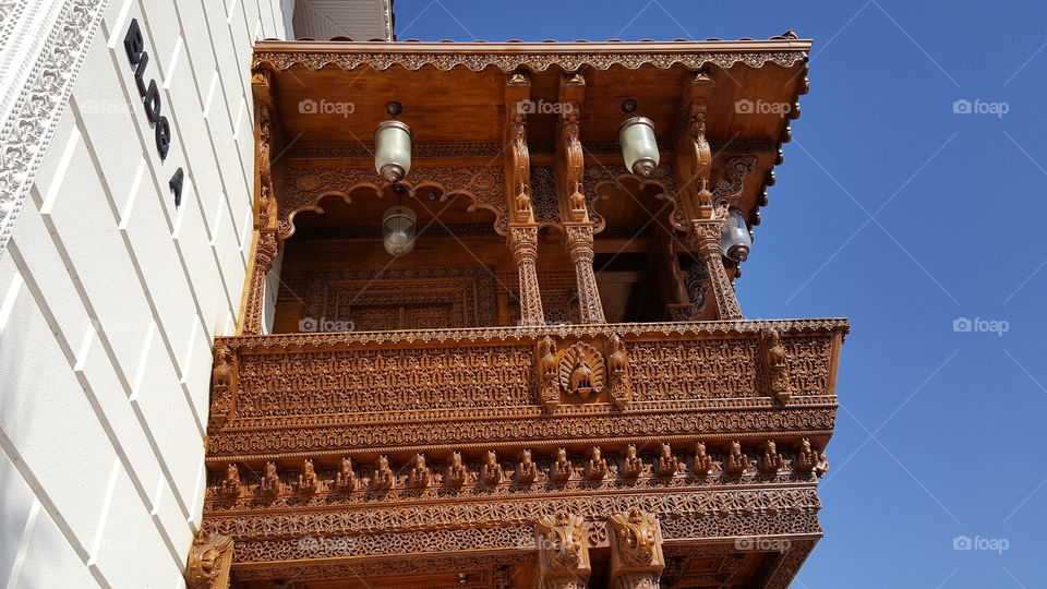 artistic balcony with wooden carving