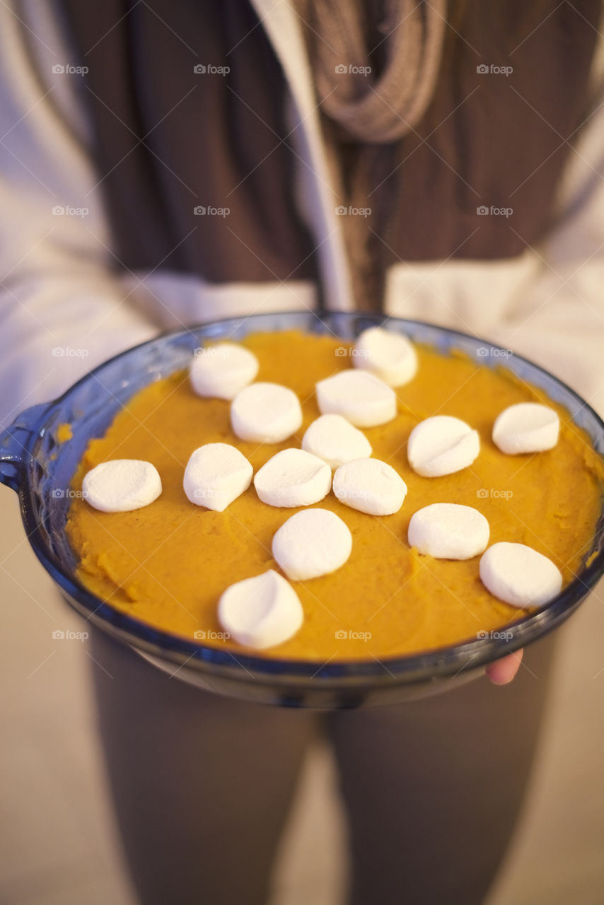 Home cooking, holding fresh sweet potato pie