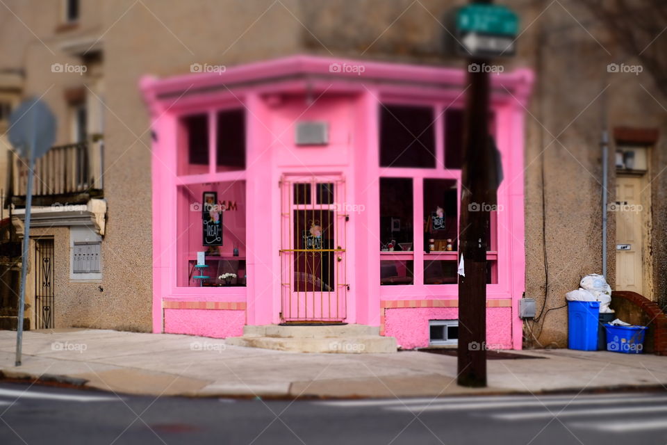 Pink business in city, bright pink building in downtown Philadelphia, bright colors in the city, pink store front, toy camera aesthetic photography, toy camera design, bright pink paint, downtown city