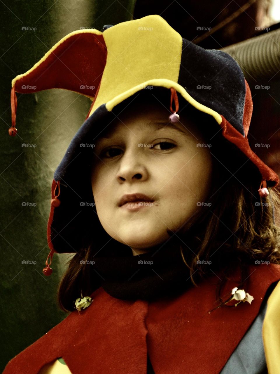 portrait of a little girl dressed as a joker