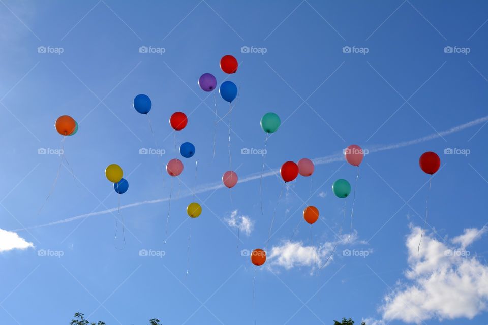 colorful balloons flying in the blue sky summer holiday