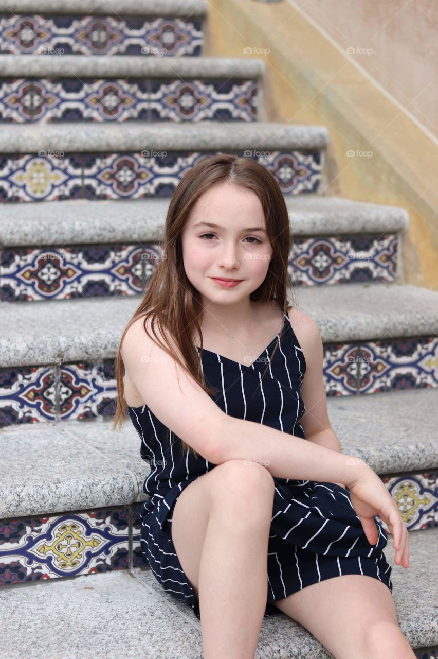 kiera on the stairs on the plaza