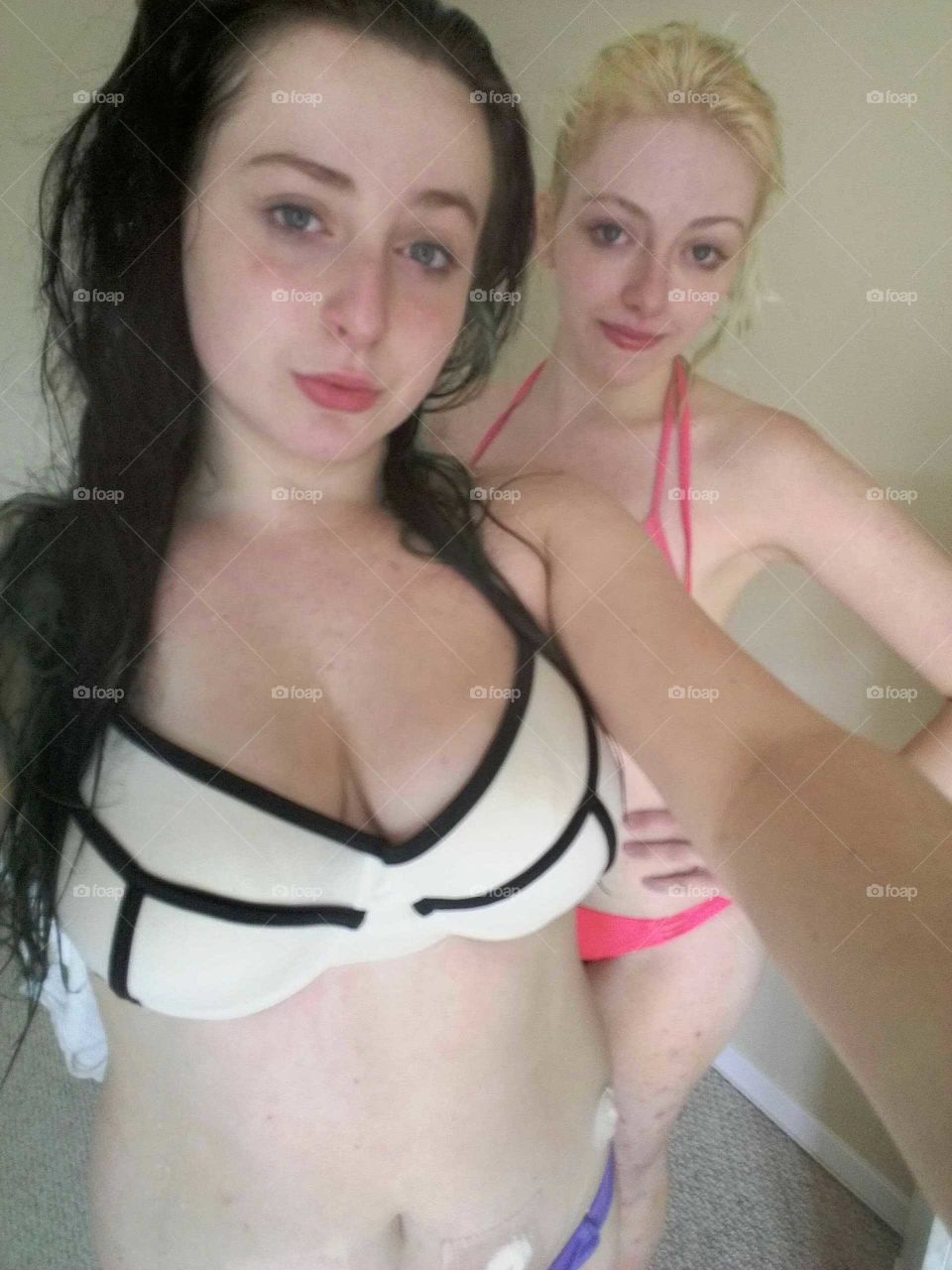 Two women's in bikini taking selfie