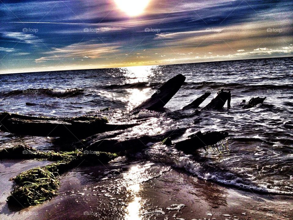 Ship wreck in sun and water