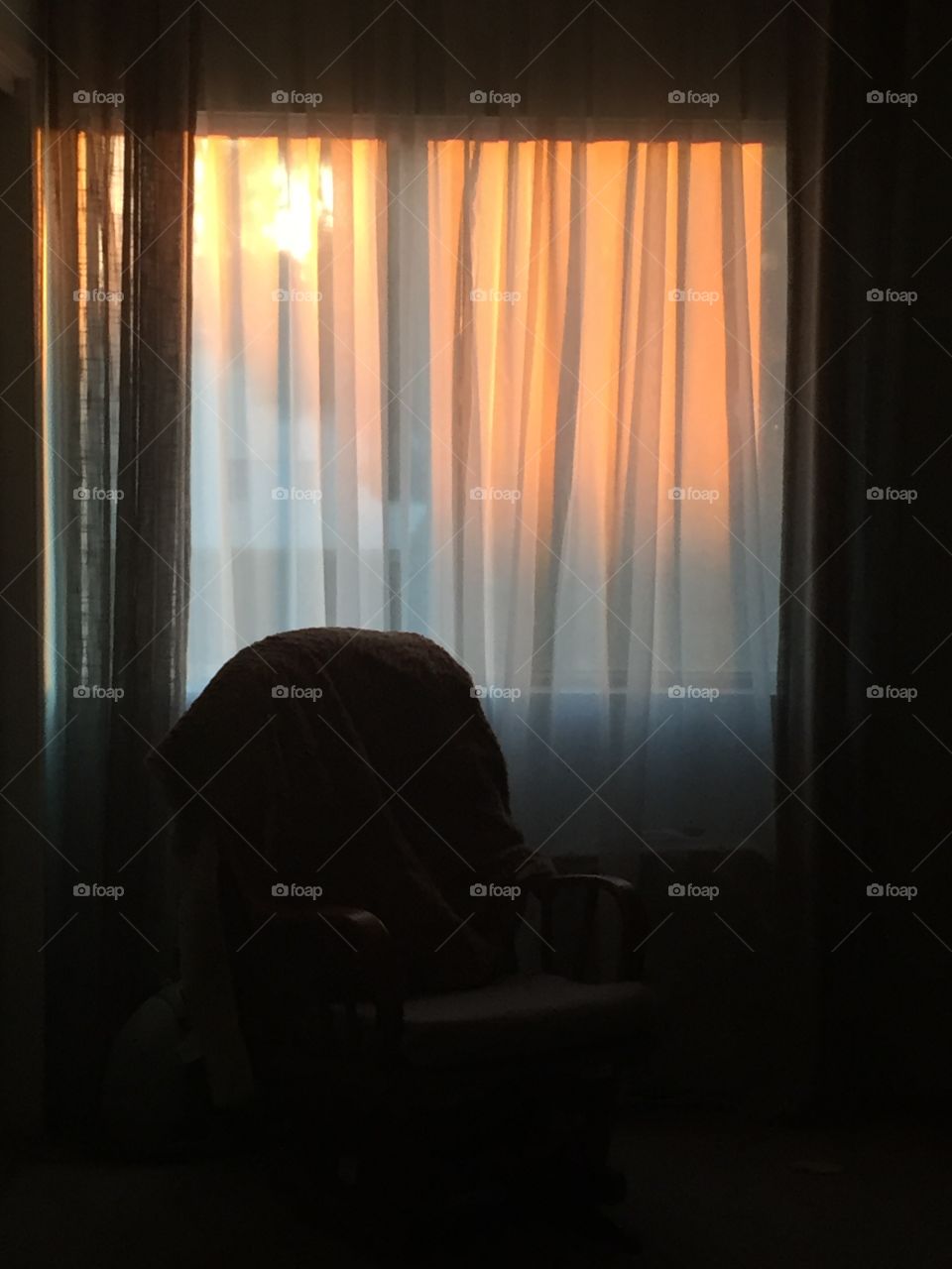Sunset view from a dark room