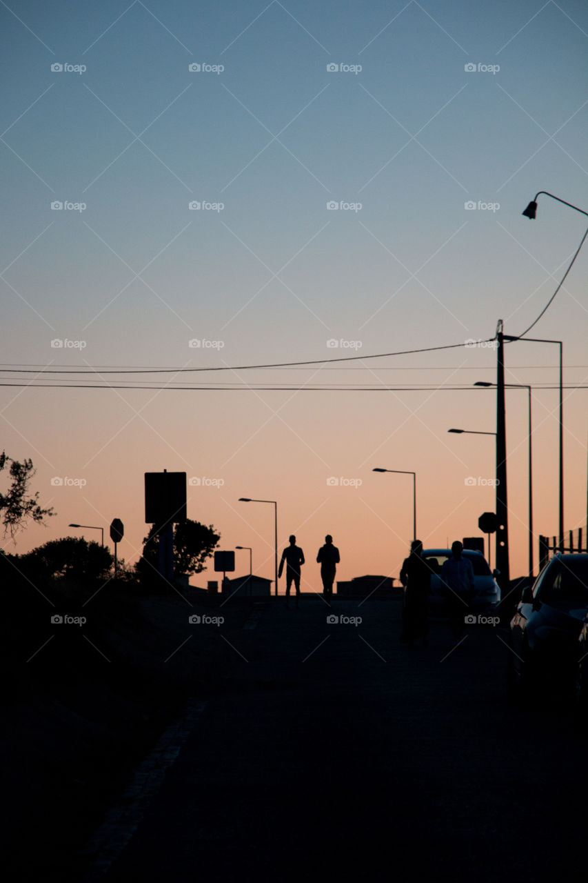 Walking the streets at dusk