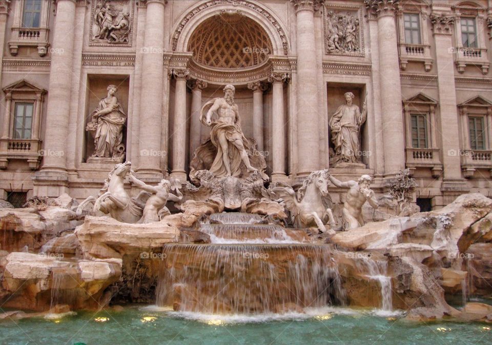 make a wish by throwing a coin at Trevi fountain in Rome 🙂