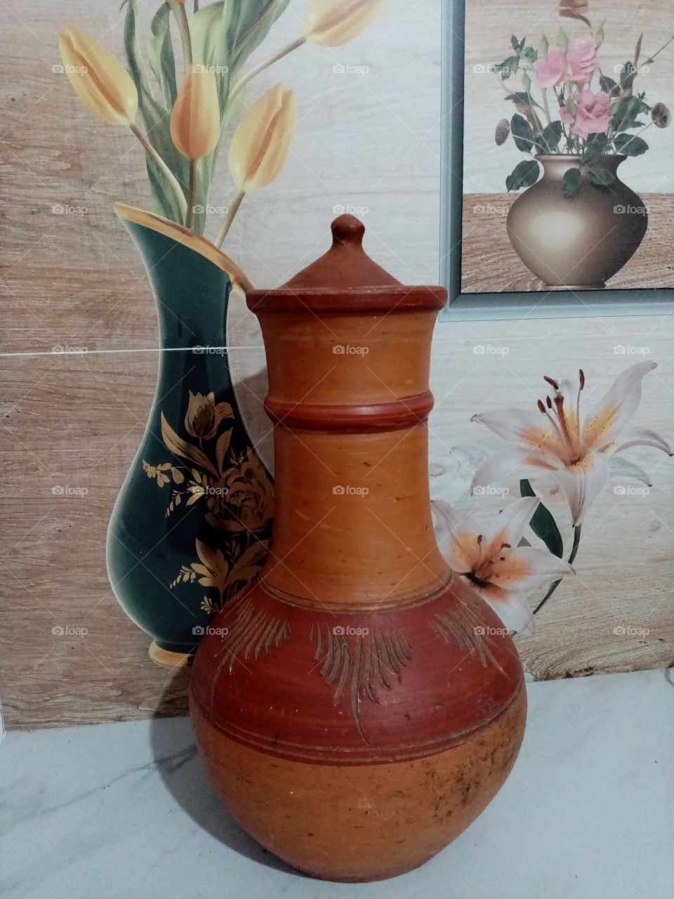 This is a clay pot which is used to keep drinking water cooling. Really cool water.