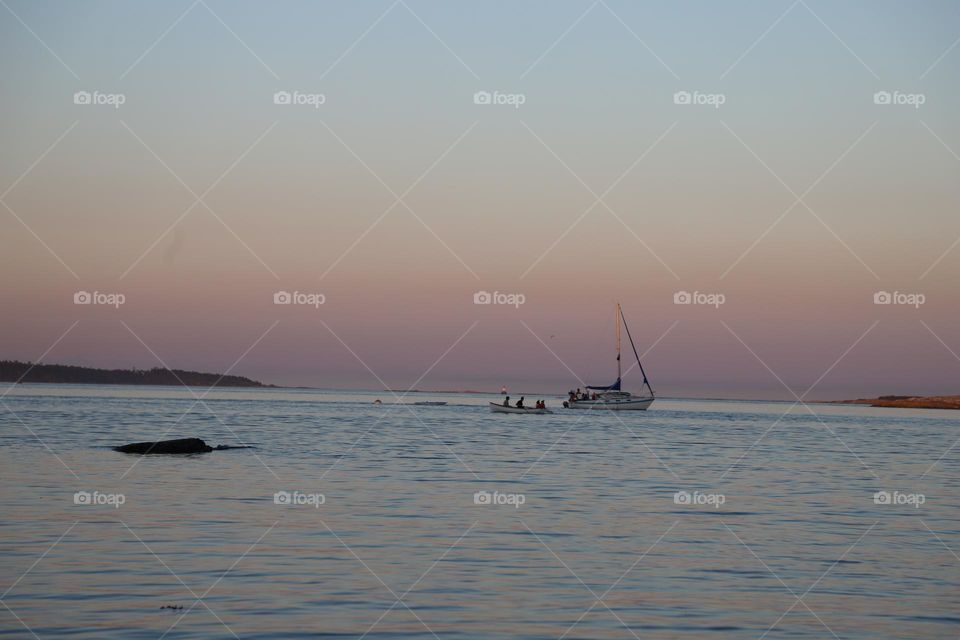 Boat on horizon