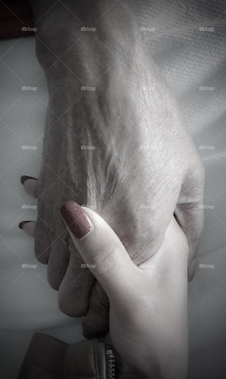 A daughter says goodbye to her father 