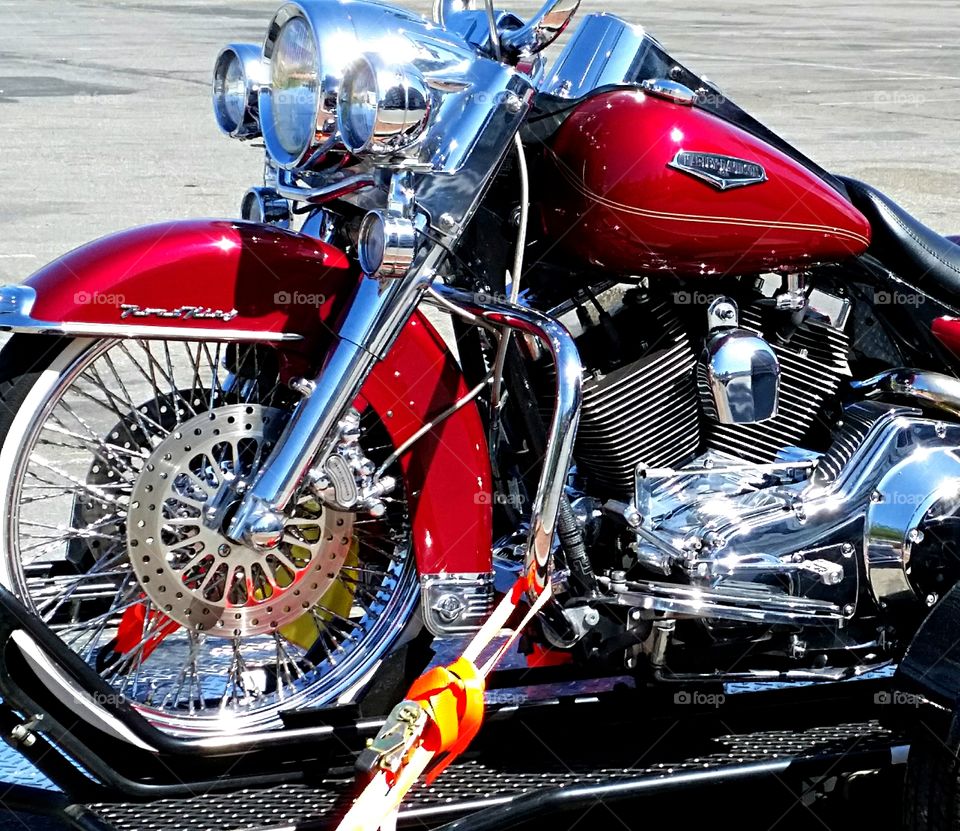 Harley. Bright, shiny Harley Davidson spotted in parking lot!