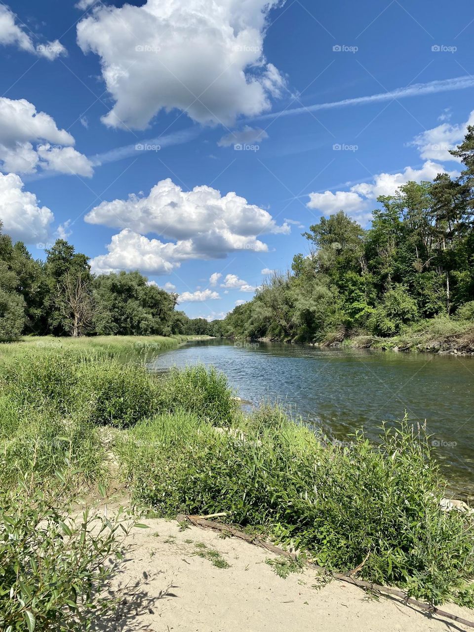 water landscape grass and clouds 