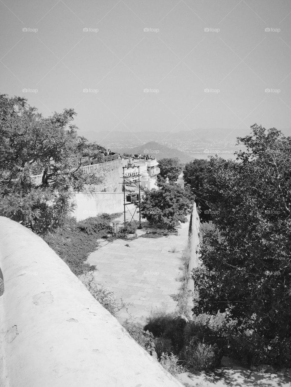 hill station, very high distance, mountain, green trees, sunlight, every thing looks very beautiful