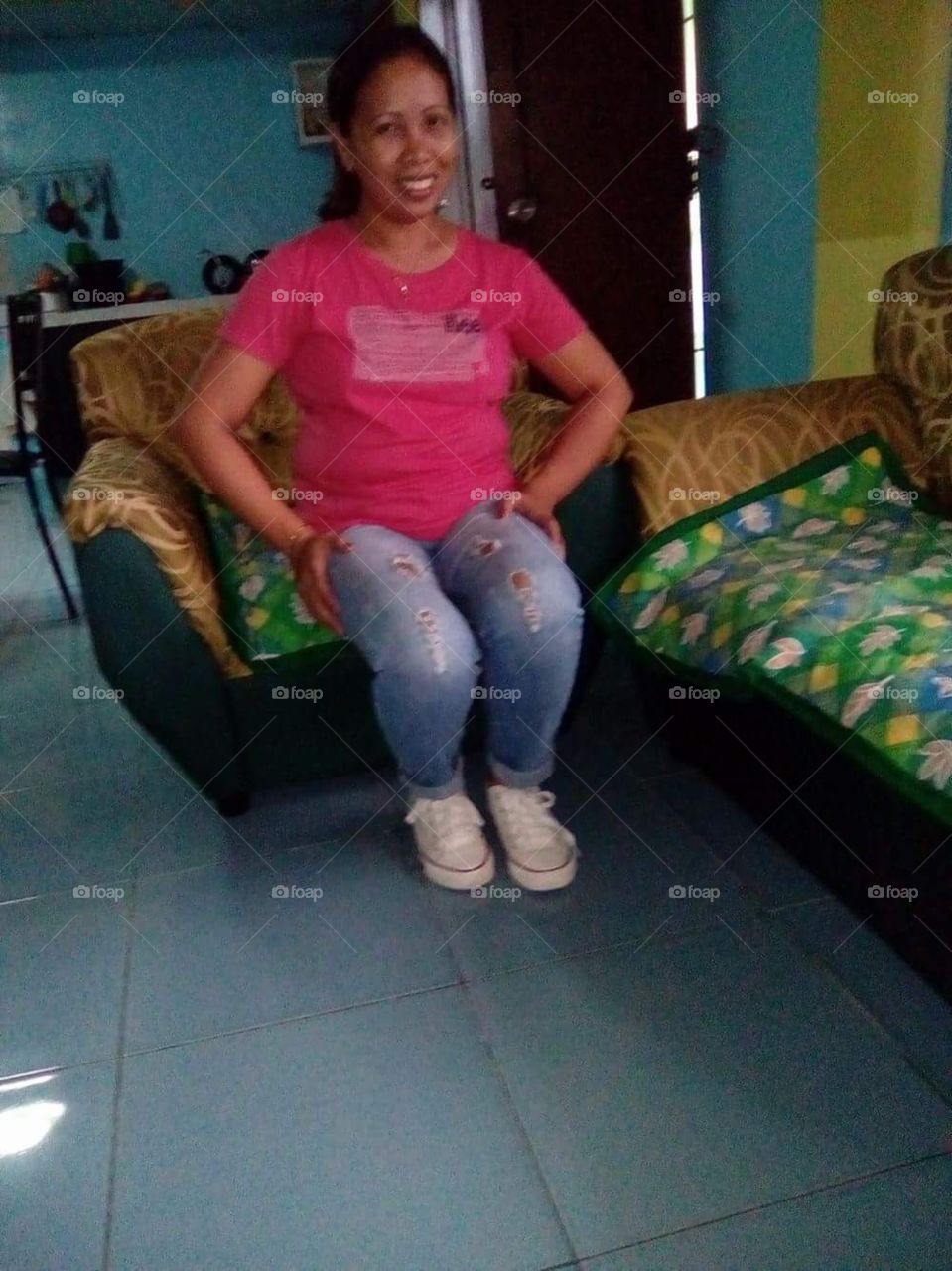 My partner relaxing a moment from busy days raising three children in the Philippines