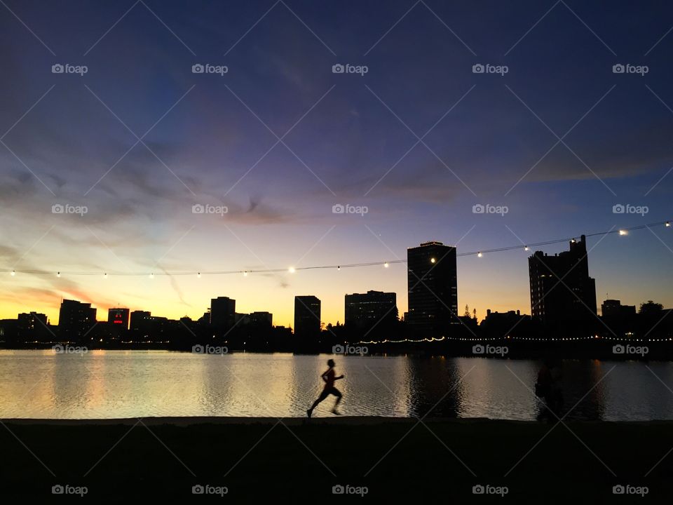 Man running at sunset