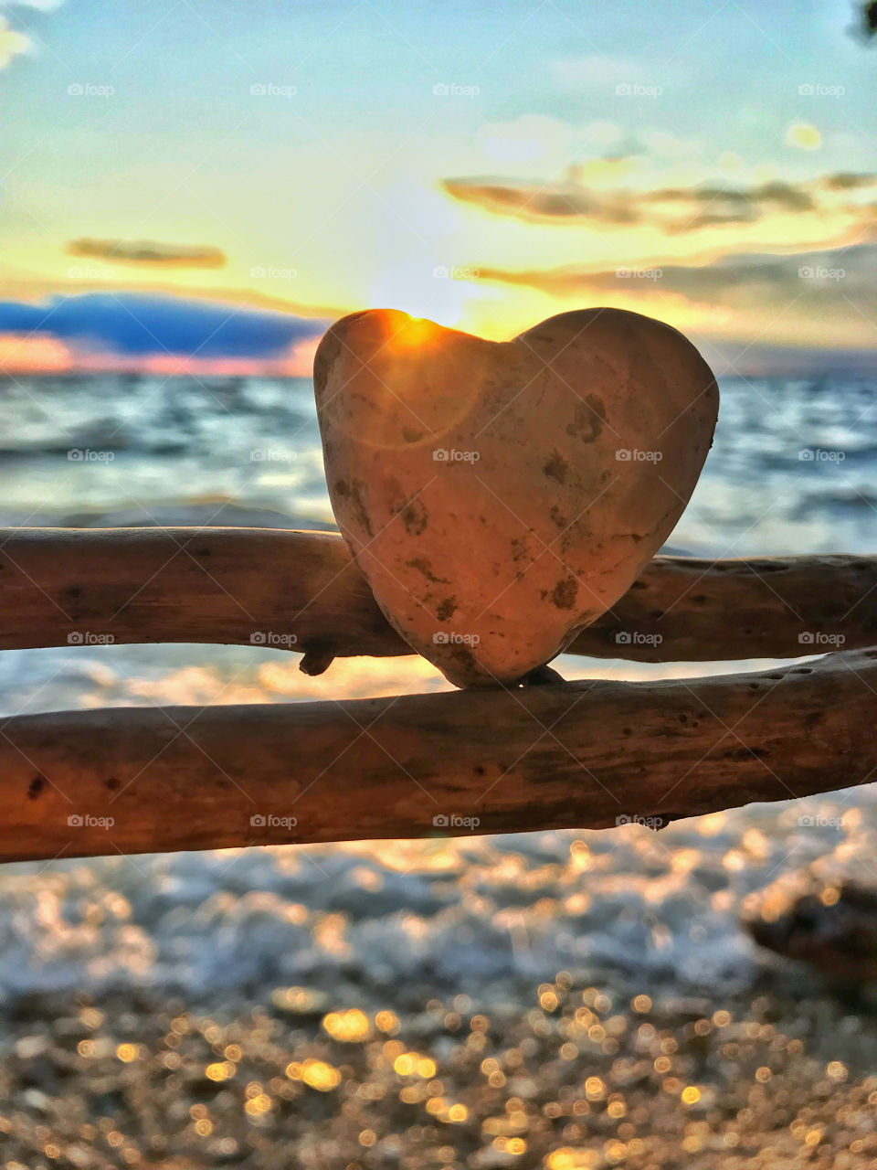 Found a heart shaped rock while watching the sun set on the beach in beautiful Door County, Wisconsin.