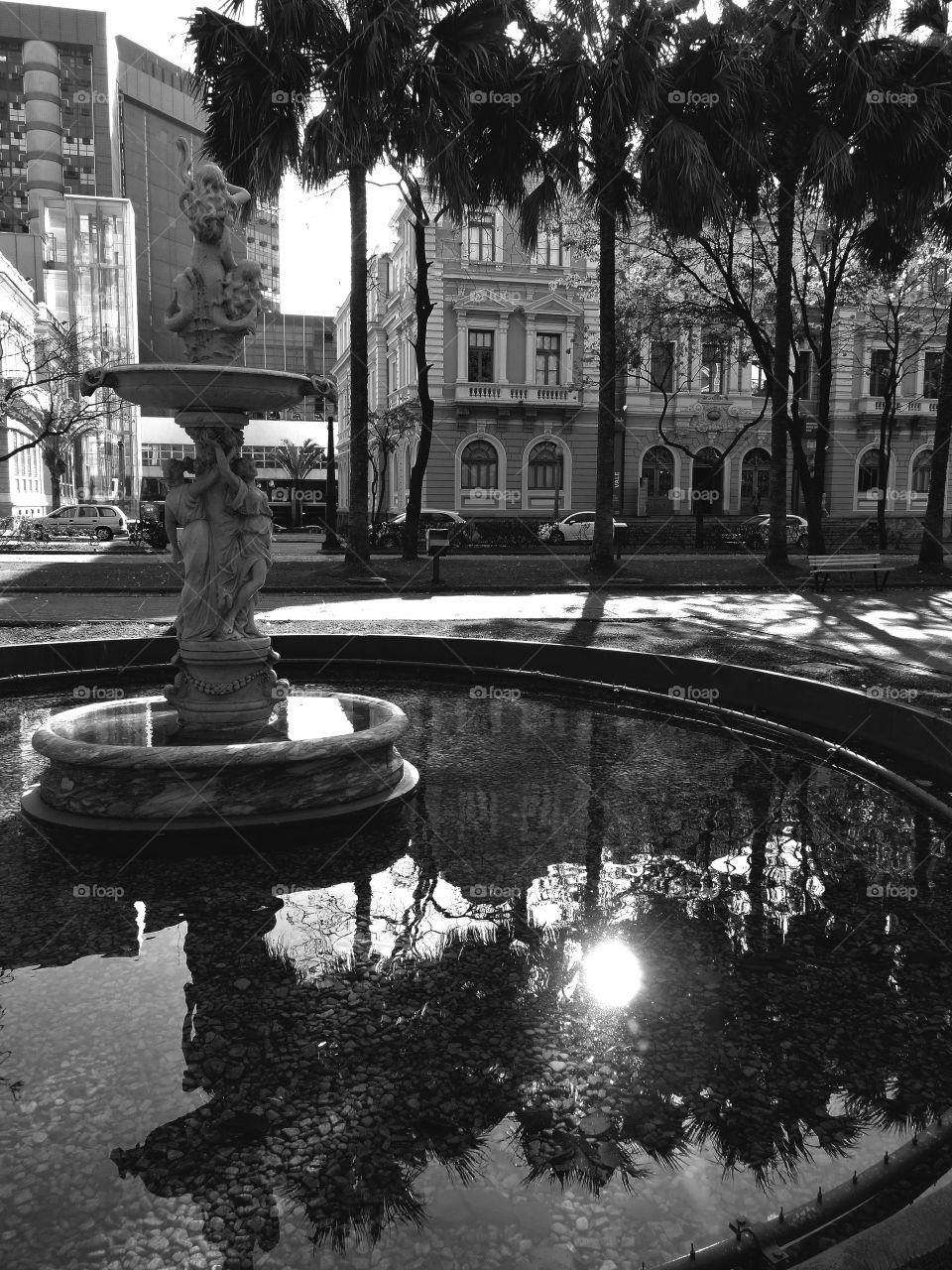 View of beautiful fountain in city near street
