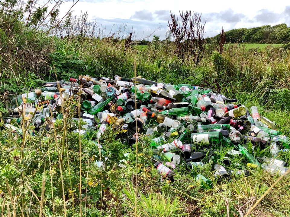 empty bottles and jars littering