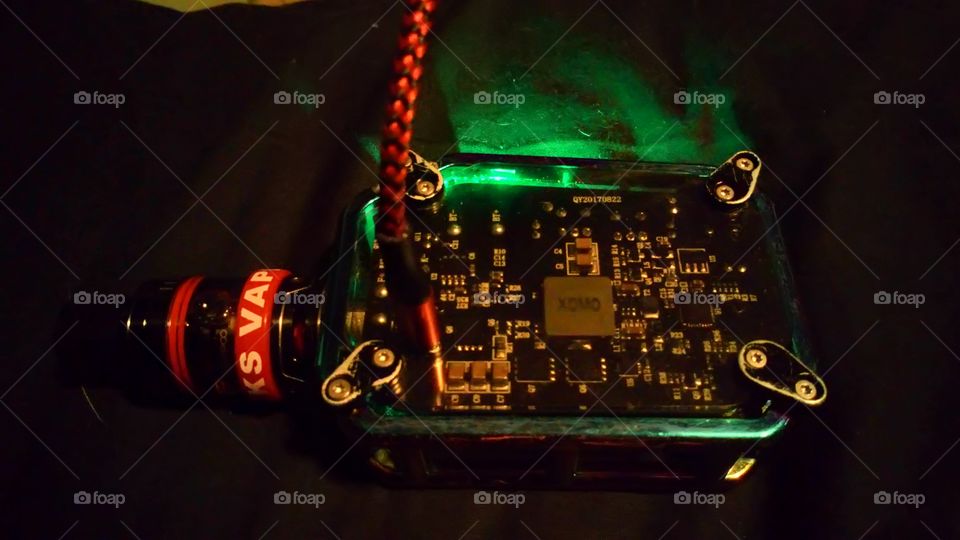 one of my vapes on charge the back side