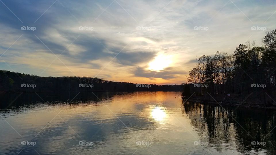 tranquil sunset on lake.