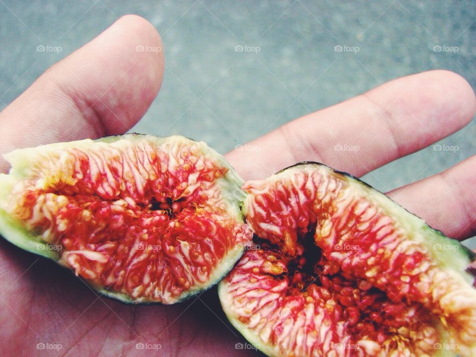 Hand with figs