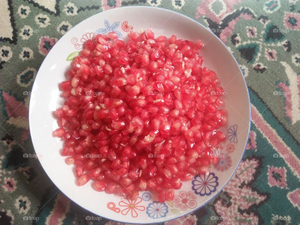 pomegranate grains .