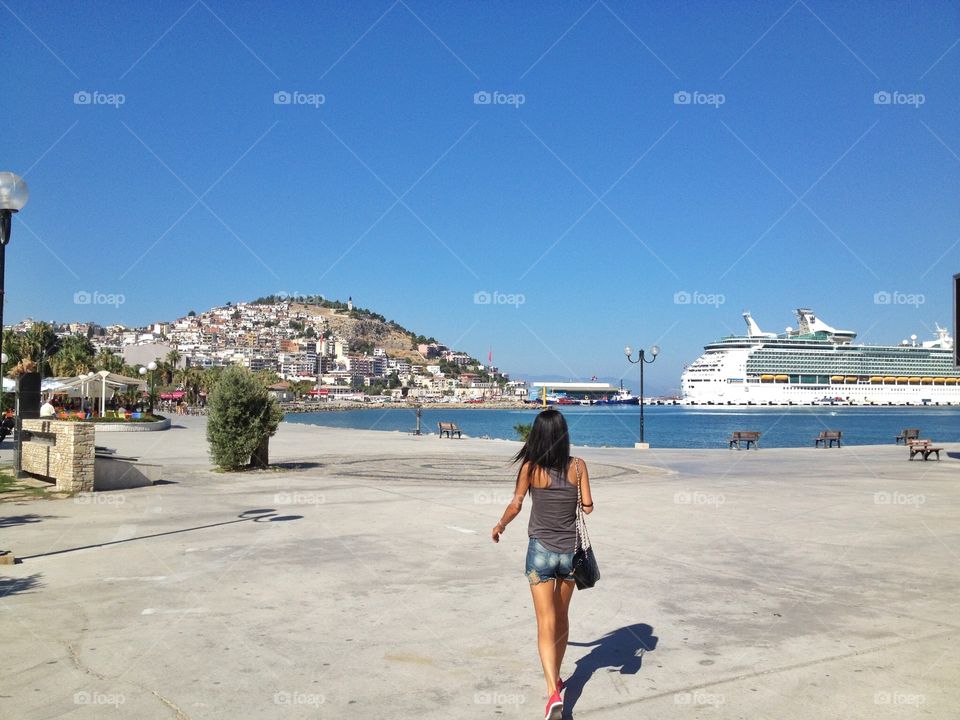 Walking at the pier. Woman is walking at the pier,Turkey