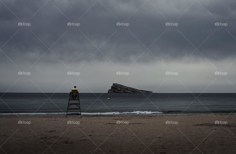 Lifeguard at sunset on the beach 