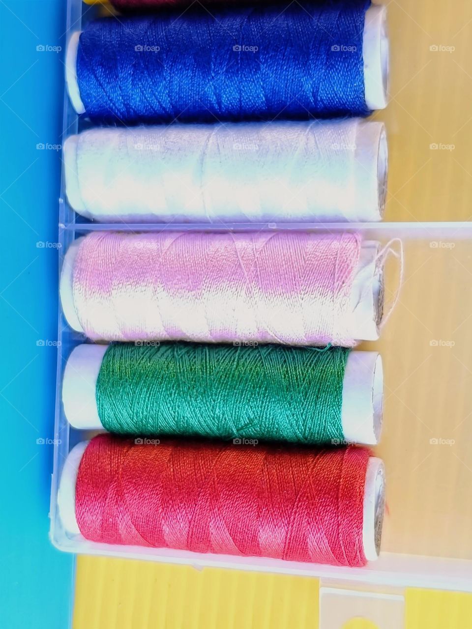 Close view all the colorful threads.