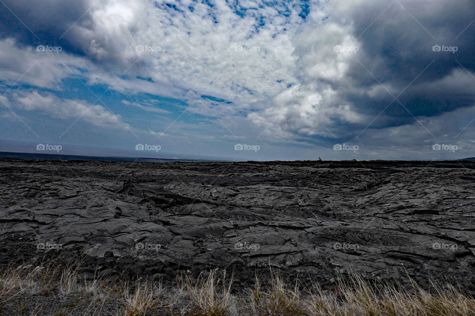 black clouds, black lava