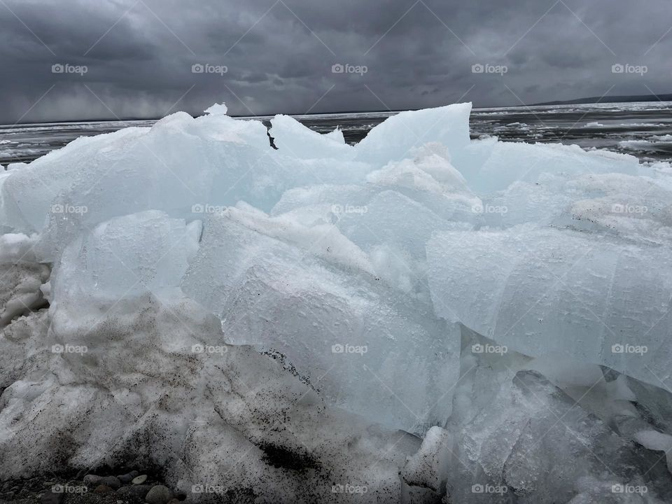 Blue ice from a frozen wave at a lake in Yellowstone National Park. 