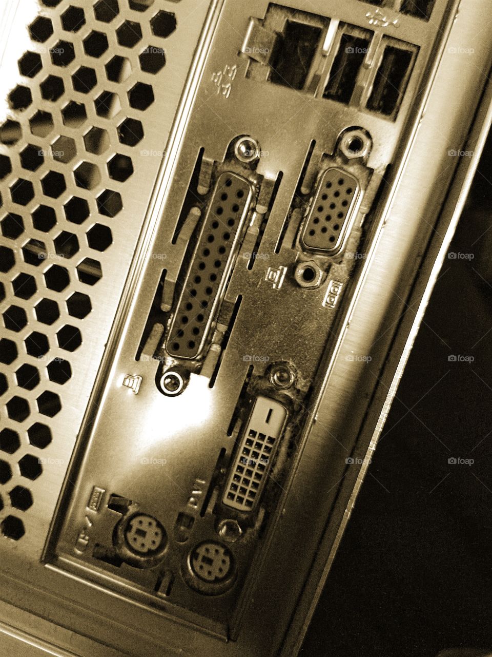 old computer mother board i/o in sepia tone