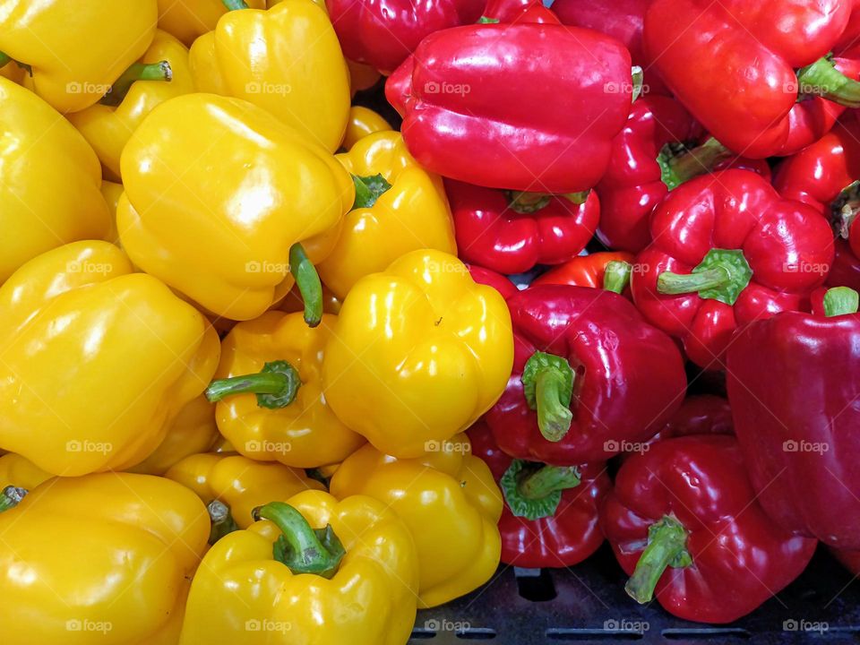 Yellow and red capsicum background.