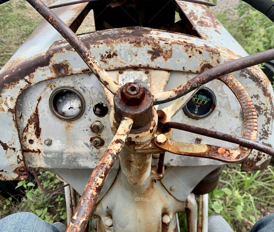 Vintage tractor rusting in the desert copper mines in southeastern Arizona 