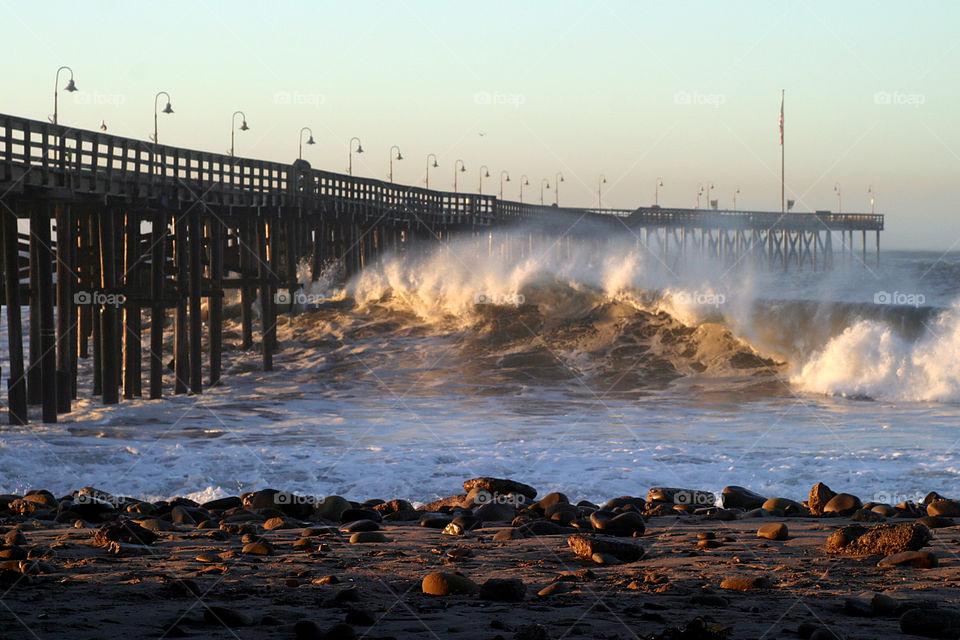 Ocean Wave Storm Pier
Ocean waves throughout at storm crashing into a the Ventura pier.