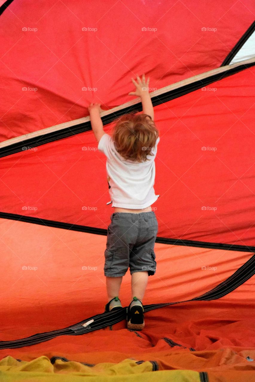 Reaching Up In A Hot Air Balloon