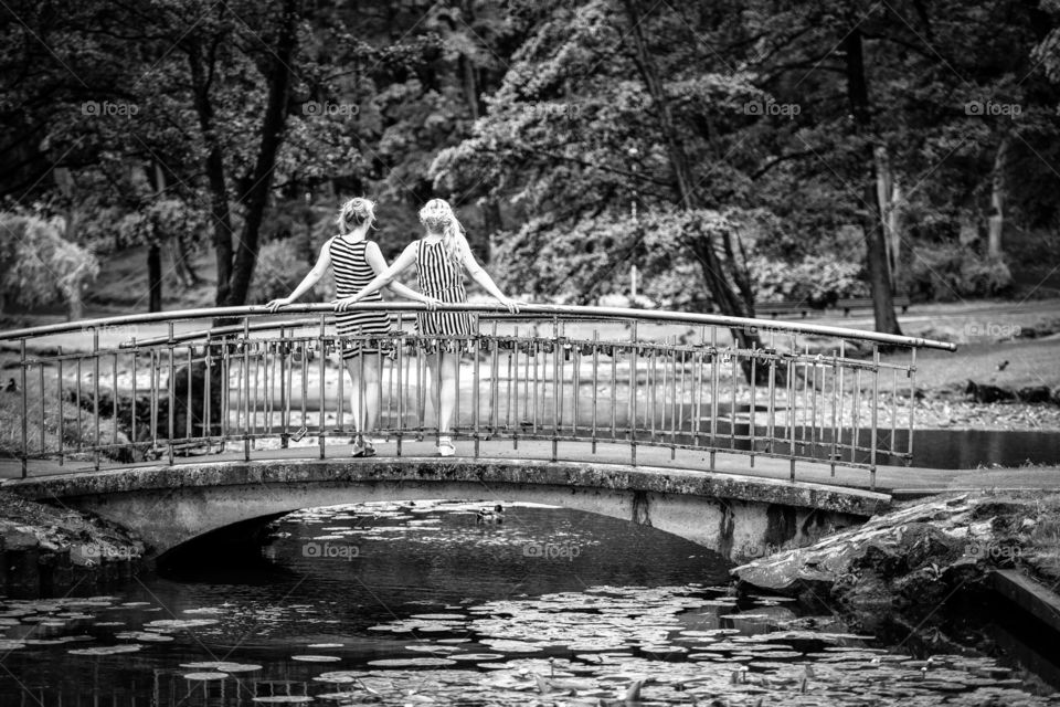 two womans on brige